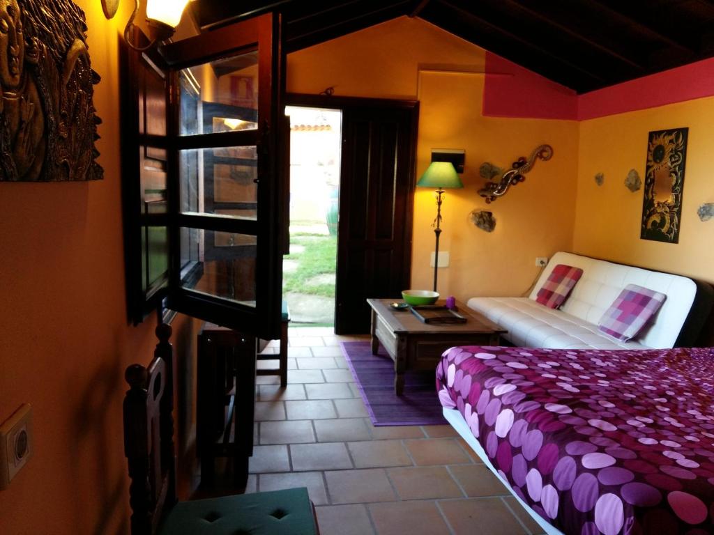 Postel nebo postele na pokoji v ubytování Casa Ida