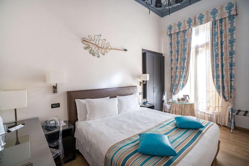 Postel nebo postele na pokoji v ubytování Best Western Plus Hotel Genova