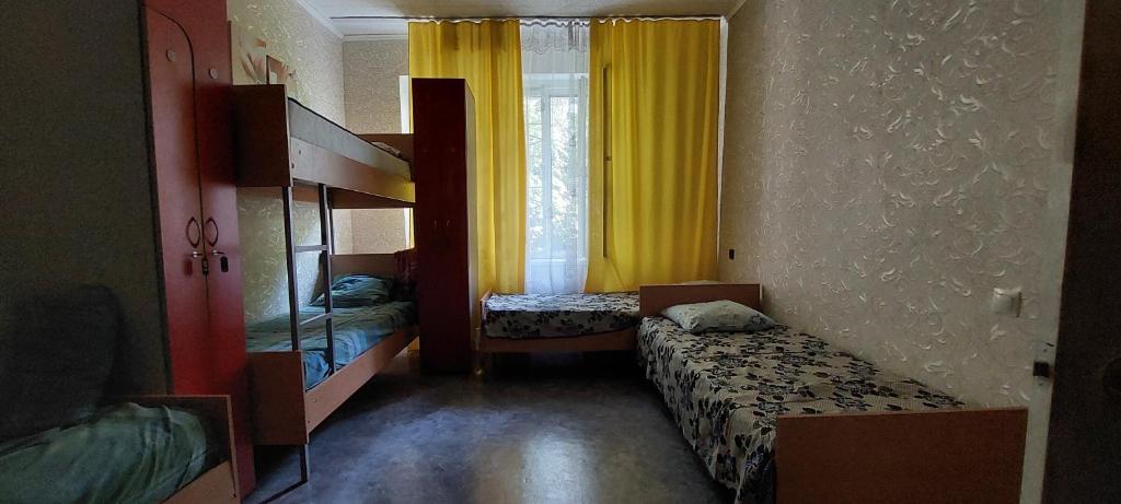 Postel nebo postele na pokoji v ubytování Eva Hostel