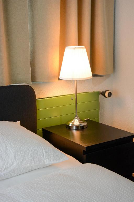 Ένα ή περισσότερα κρεβάτια σε δωμάτιο στο Alaïa Hostel