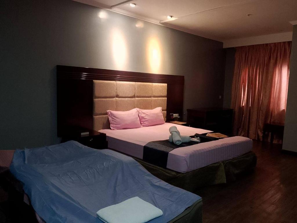 Postel nebo postele na pokoji v ubytování Jjimjbang hotel spa