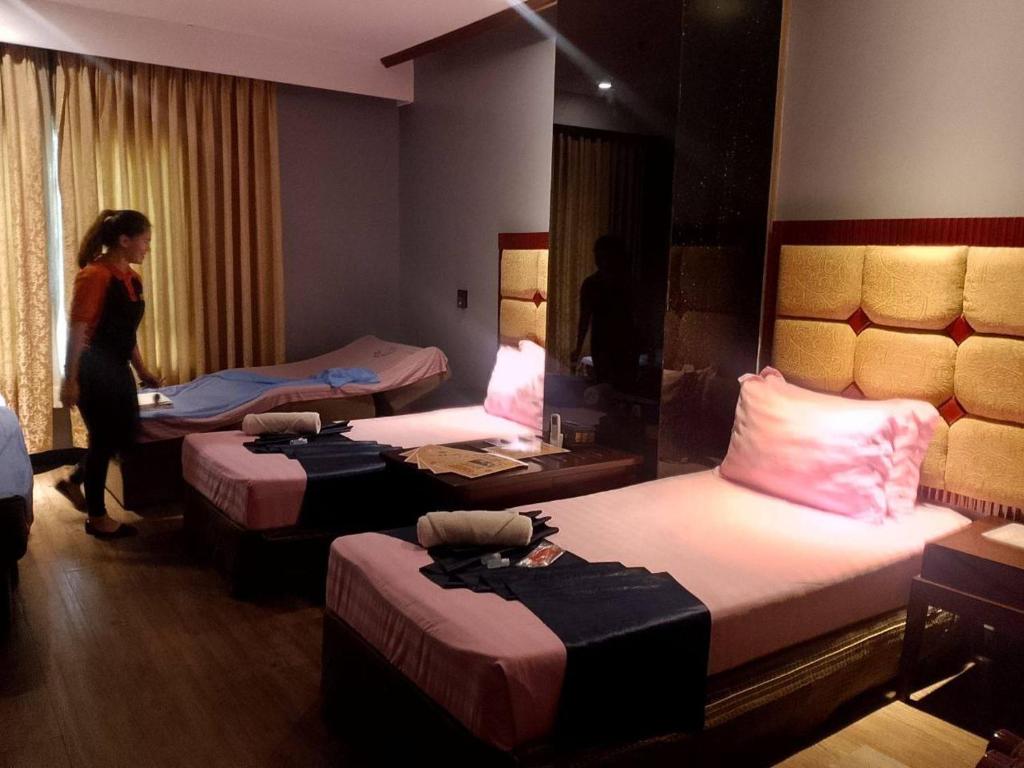 Postel nebo postele na pokoji v ubytování Jjimjbang hotel spa