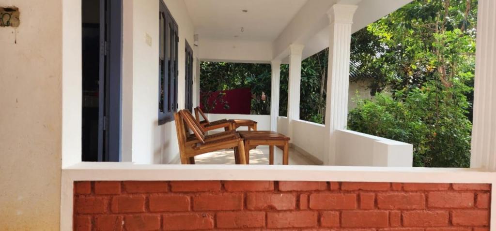 Balkón nebo terasa v ubytování Magnolia Guesthouse Varkala