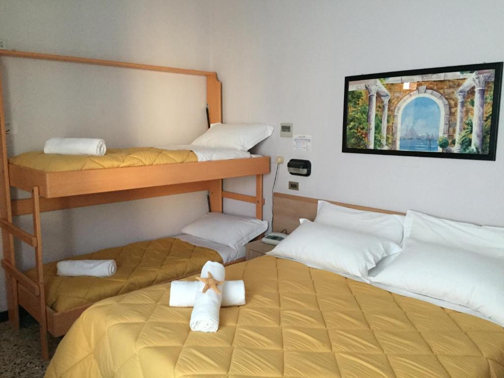 Postel nebo postele na pokoji v ubytování Abc Hotel