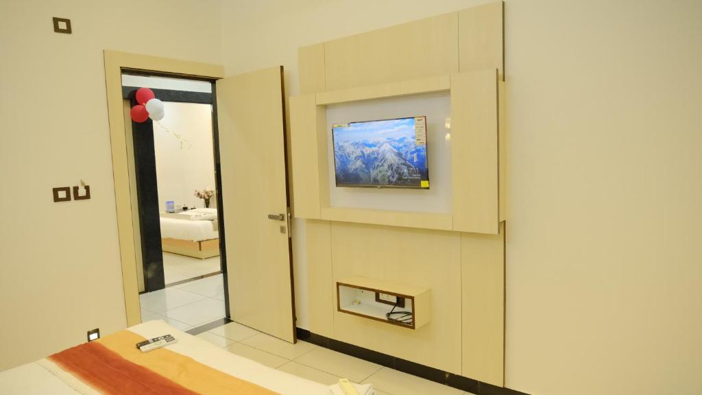 TV a/nebo společenská místnost v ubytování Hotel Sun Palace