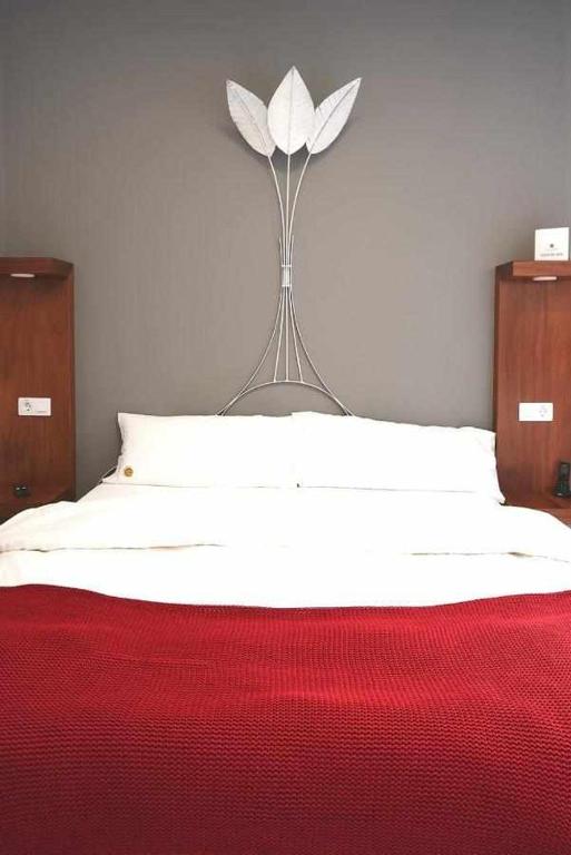 Posteľ alebo postele v izbe v ubytovaní Delmás Hotel Emblemático