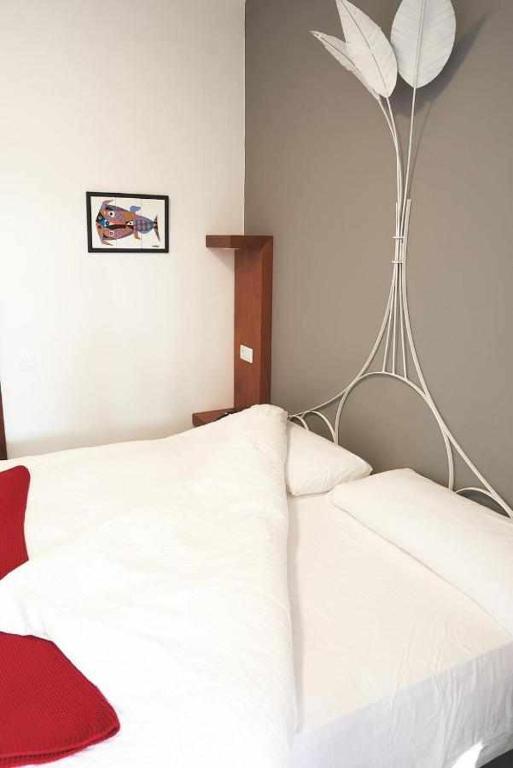 Posteľ alebo postele v izbe v ubytovaní Delmás Hotel Emblemático