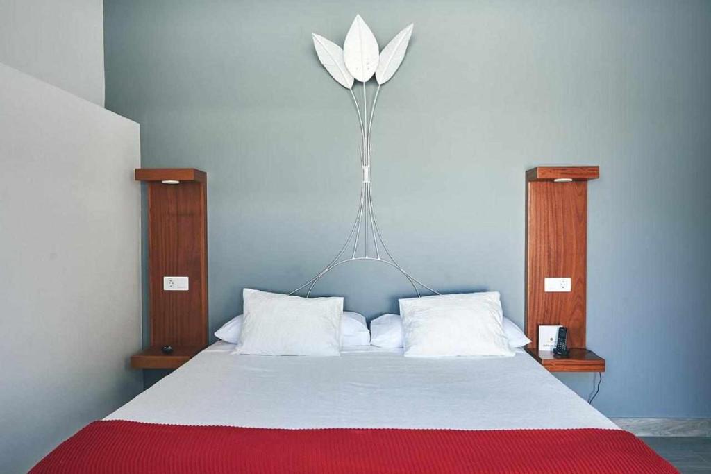 Posteľ alebo postele v izbe v ubytovaní Delmás Hotel Emblemático