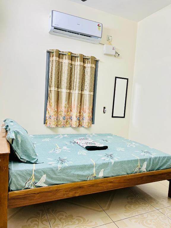 Postel nebo postele na pokoji v ubytování Lumina Home Stay