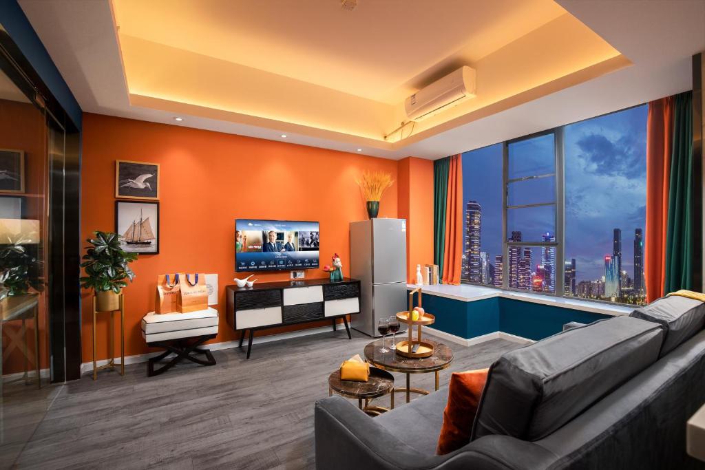 TV a/nebo společenská místnost v ubytování Chengdu Shuxi International Serviced Apartment