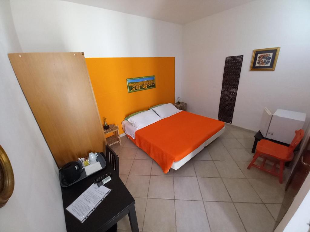 Postel nebo postele na pokoji v ubytování Breezes B&B