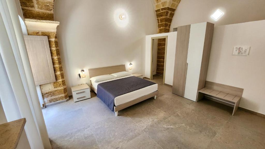 Postel nebo postele na pokoji v ubytování Perla Suite