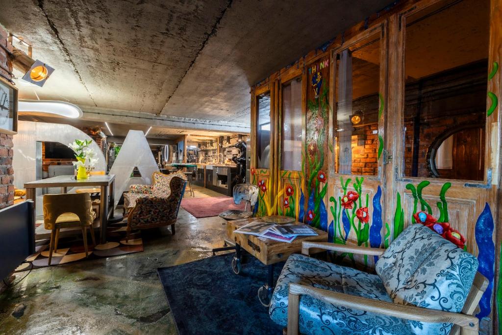 Χώρος καθιστικού στο Apartament Fabryka Kobra