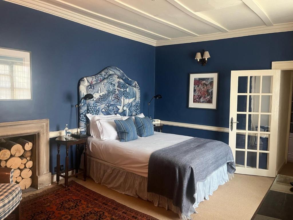 Uma cama ou camas num quarto em The Bay Tree Hotel