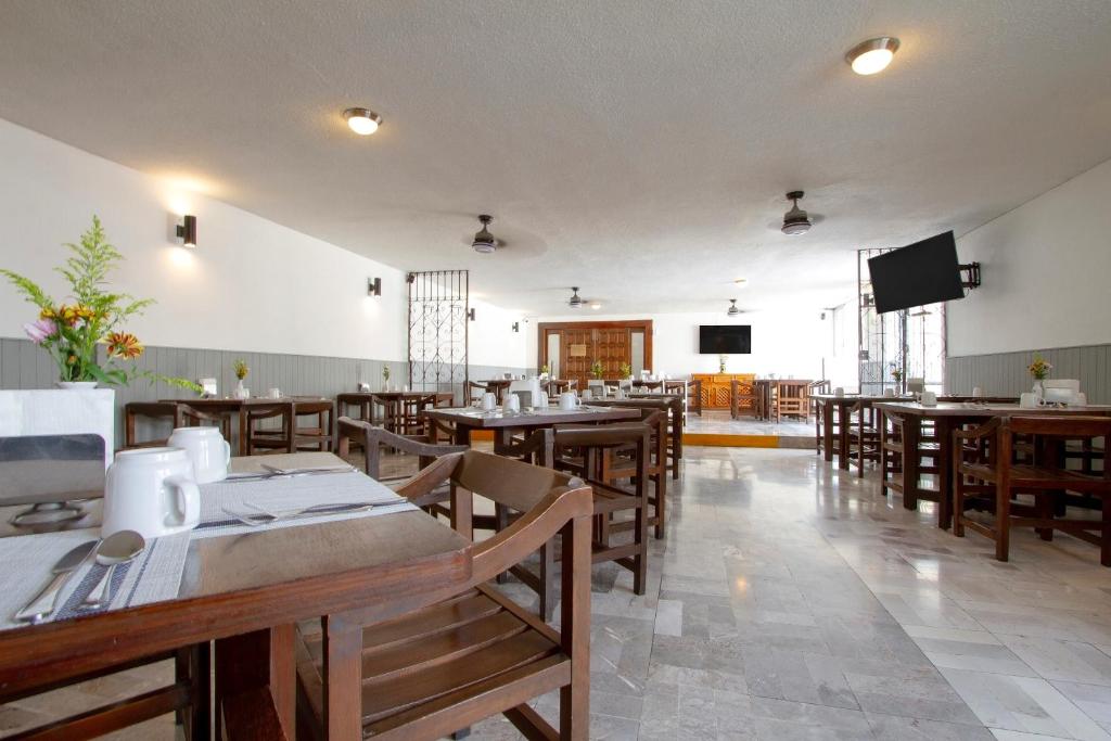 TV a/nebo společenská místnost v ubytování Hotel Bedd Express Querétaro