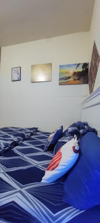 Postel nebo postele na pokoji v ubytování MAMA DELiGHT HOME