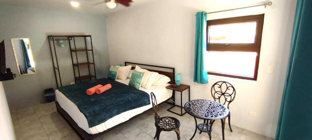 Postel nebo postele na pokoji v ubytování Hotel Tabasco