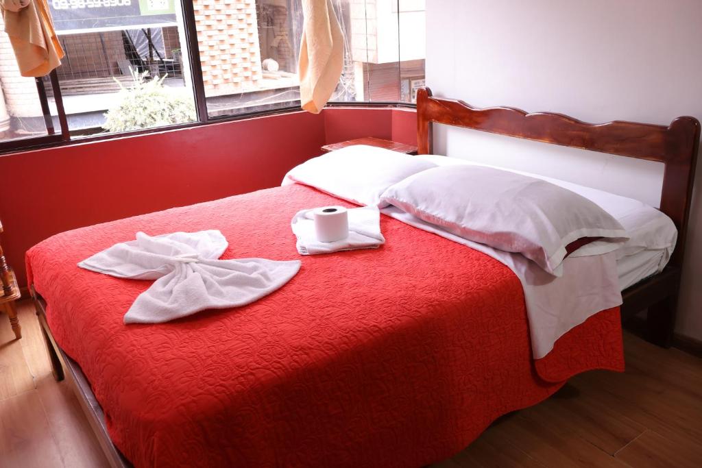 Postel nebo postele na pokoji v ubytování Andes Hostal