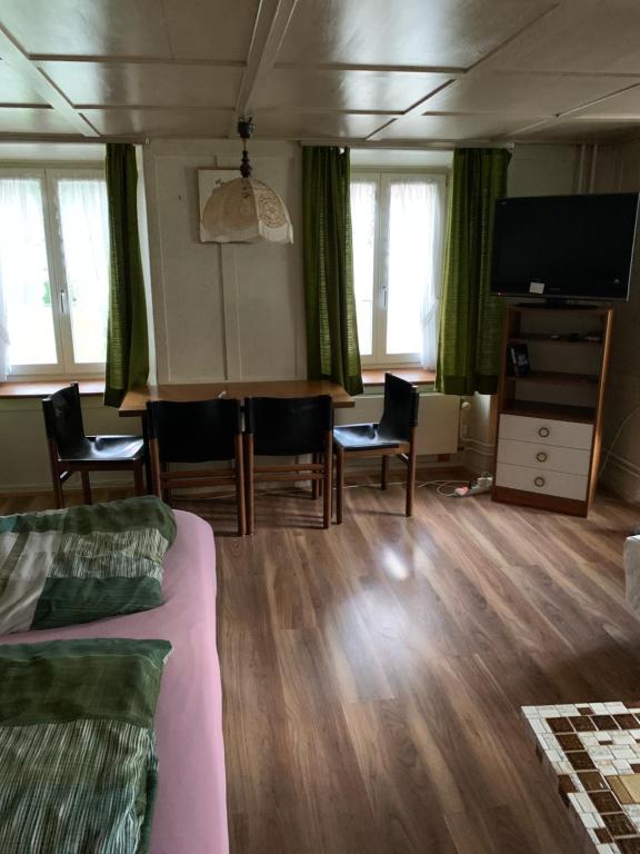 TV a/nebo společenská místnost v ubytování Vista a los Alpes