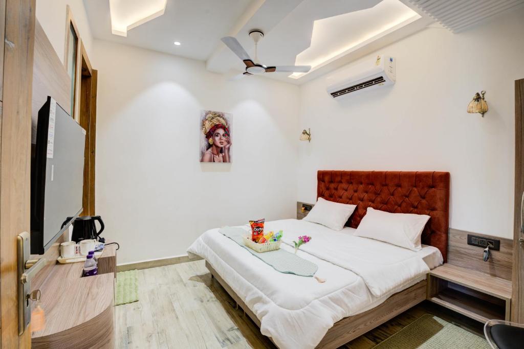 Postel nebo postele na pokoji v ubytování Amaltaash by Sandane Homes
