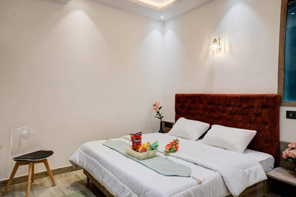 Postel nebo postele na pokoji v ubytování Amaltaash by Sandane Homes