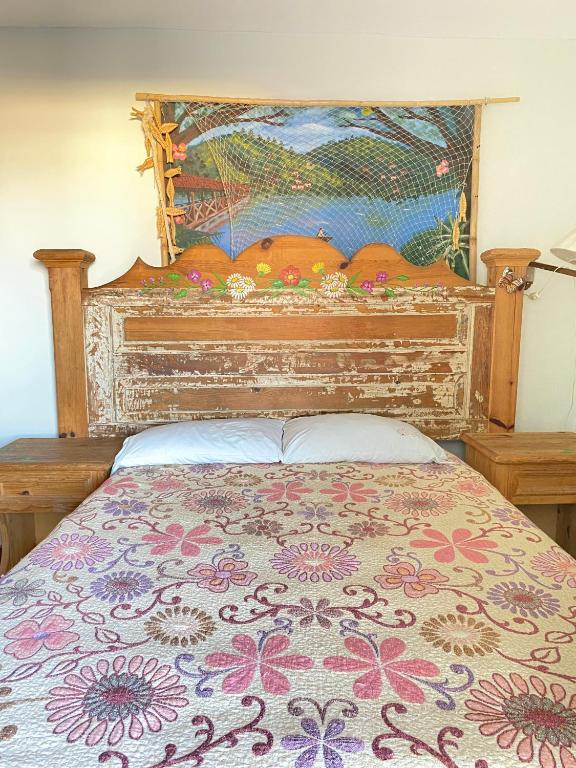 Postel nebo postele na pokoji v ubytování Hostal San Fransiskuni