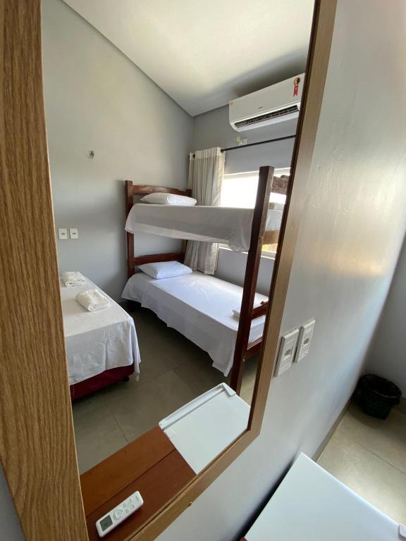Postel nebo postele na pokoji v ubytování Deck Pousada