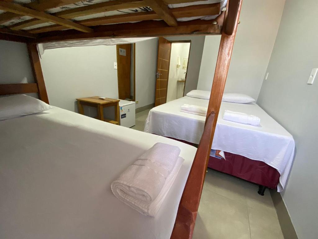 Postel nebo postele na pokoji v ubytování Deck Pousada