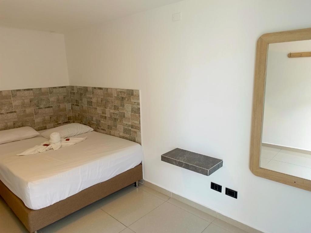 Postel nebo postele na pokoji v ubytování Hotel Buenos Aires Central