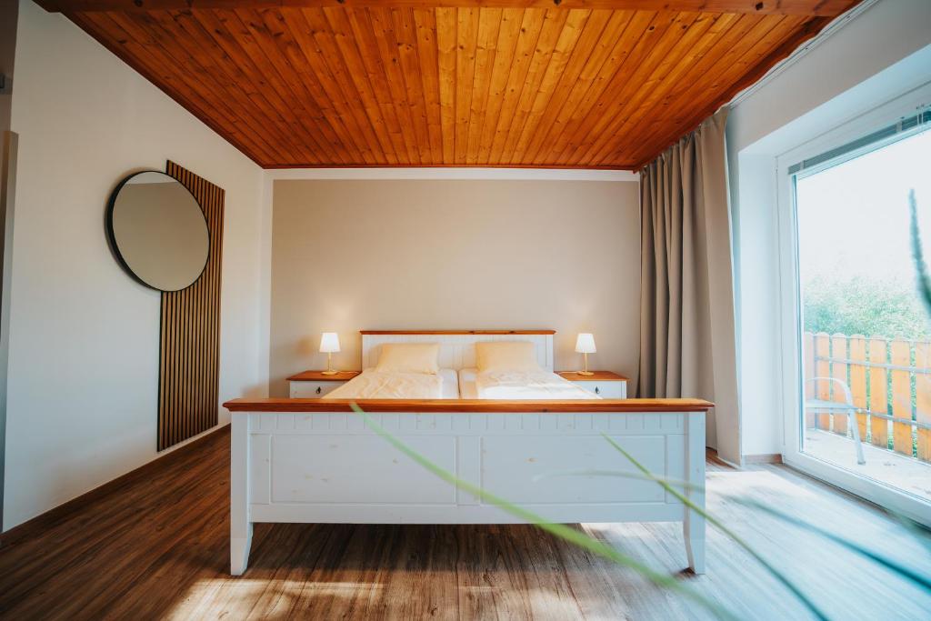 Posteľ alebo postele v izbe v ubytovaní Hotel Leo