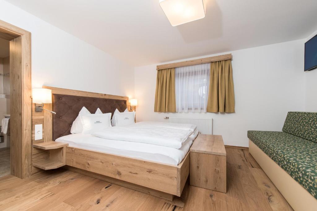 Posteľ alebo postele v izbe v ubytovaní Appartement Landhaus KERSCHDORFER
