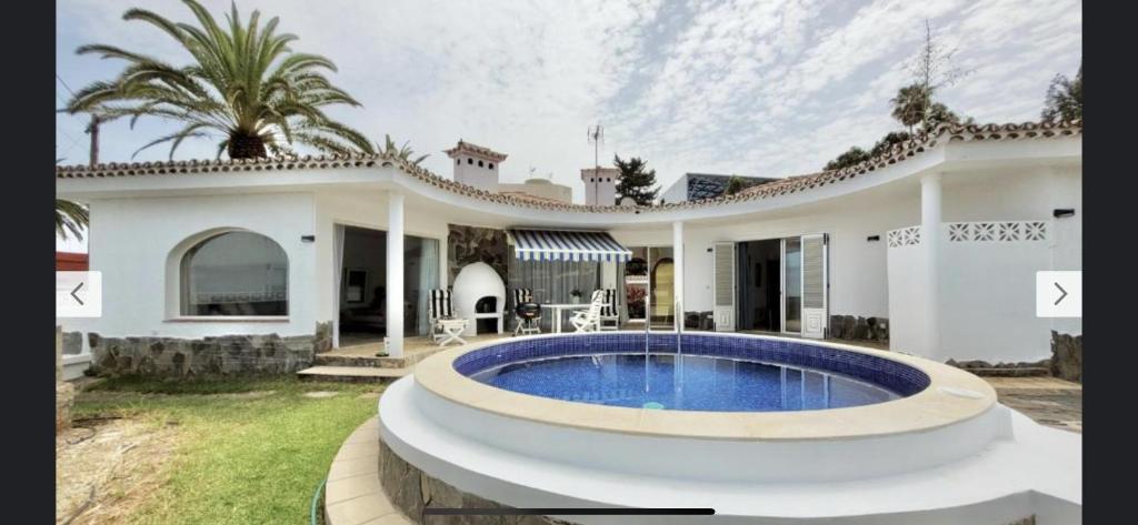 a house with a large pool in front of it at Casa Al Castello - Apartments Buccino in Buccino