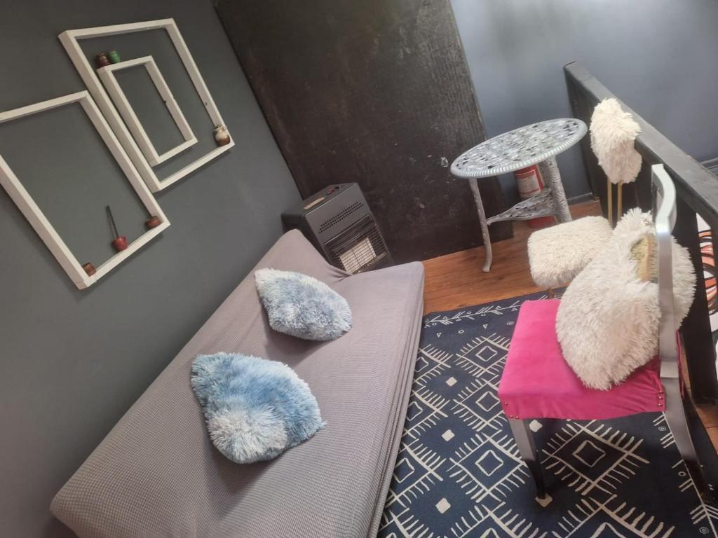Un lugar para sentarse en Hostel INK - Duerme Como En Casa