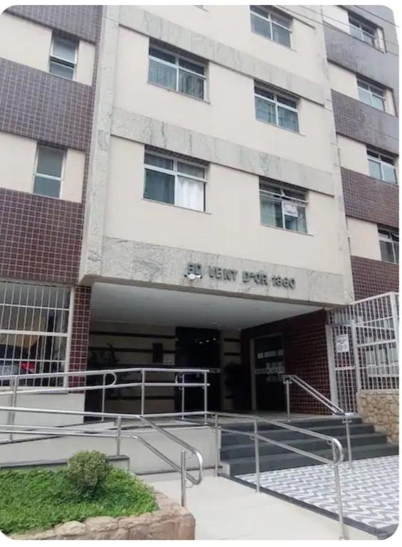 a building with a staircase in front of a building at AP Ventidor in Guarapari