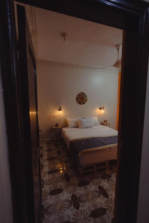 Postel nebo postele na pokoji v ubytování Wanees Hostel