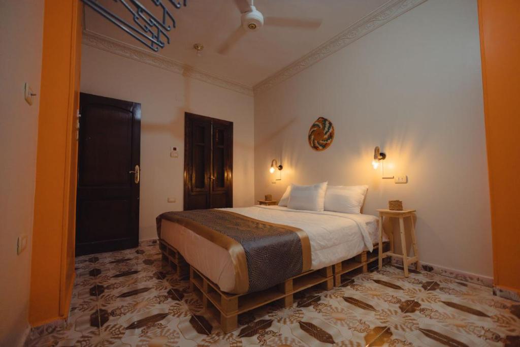 Postel nebo postele na pokoji v ubytování Wanees Hostel