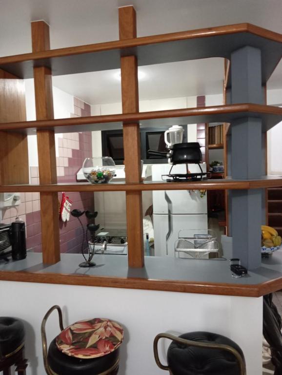 Kuchyň nebo kuchyňský kout v ubytování Residencial com Serviço