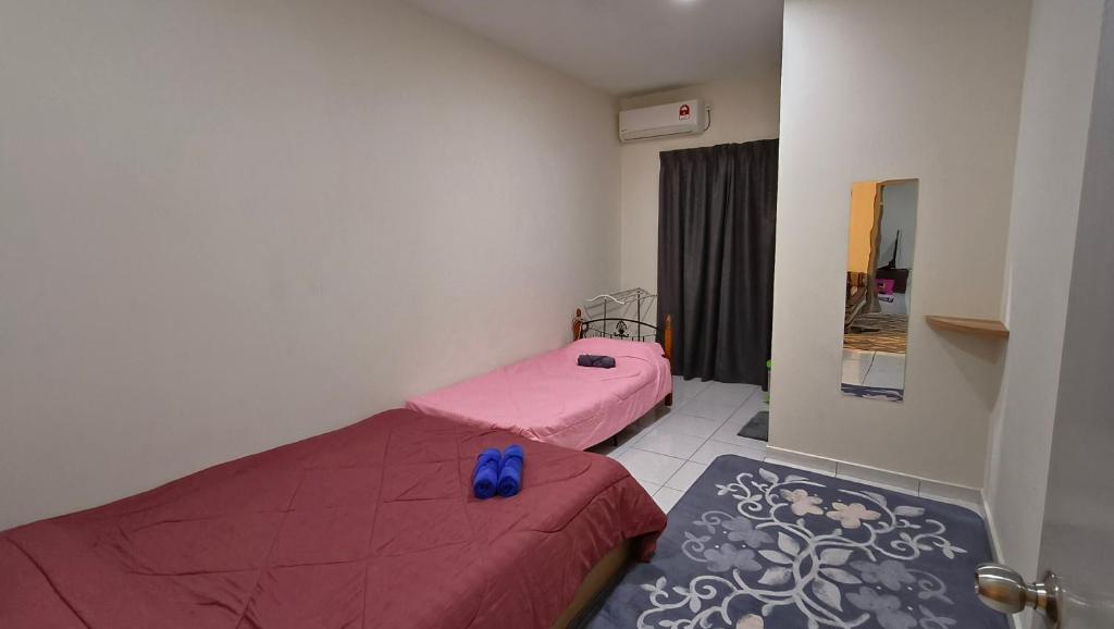 Postel nebo postele na pokoji v ubytování Tasneem Haven Guesthouse