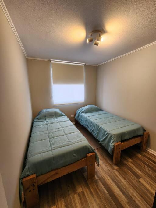 Postel nebo postele na pokoji v ubytování Moderno y céntrico departamento