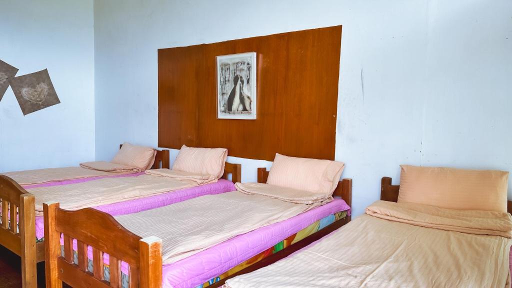 Postel nebo postele na pokoji v ubytování Baguio BELL Staycation