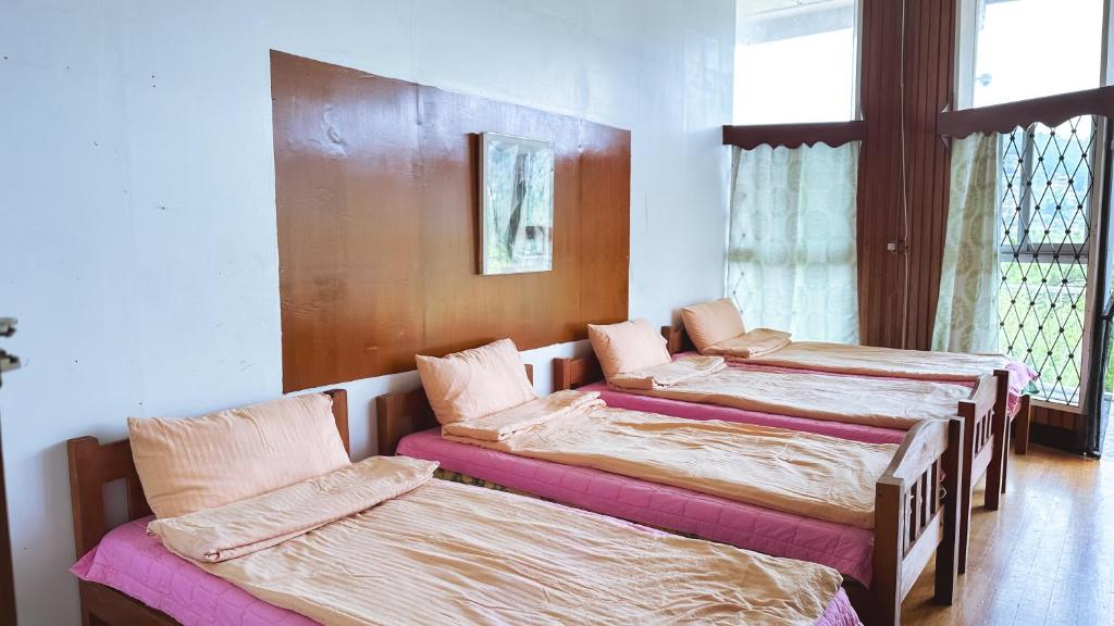 Postel nebo postele na pokoji v ubytování Baguio BELL Staycation
