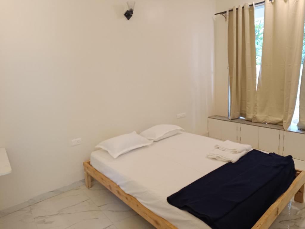 Postel nebo postele na pokoji v ubytování Ecoark Farmstay