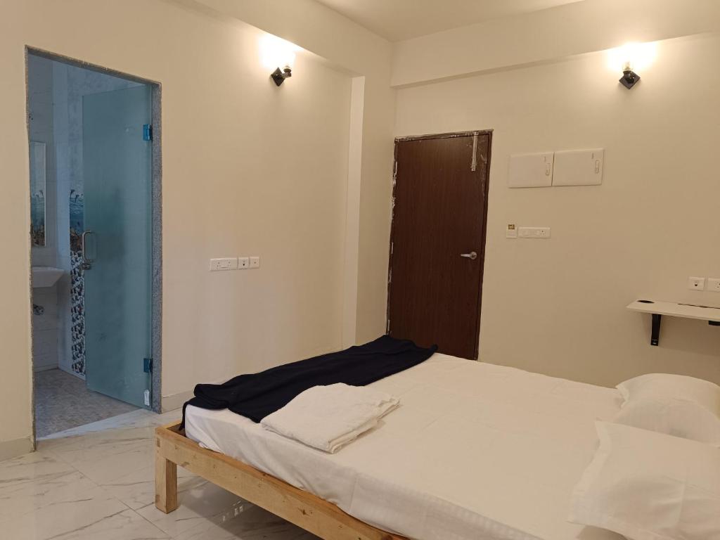Postel nebo postele na pokoji v ubytování Ecoark Farmstay