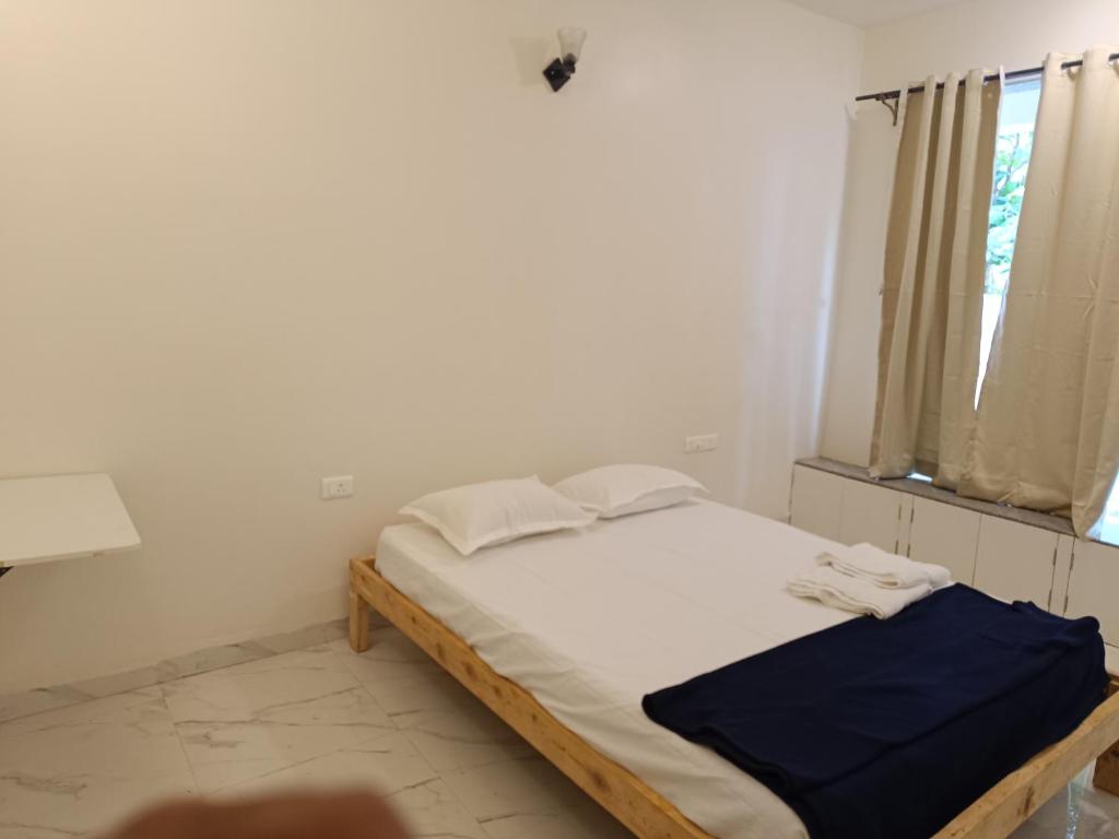 Postel nebo postele na pokoji v ubytování Ecoark Farmstay