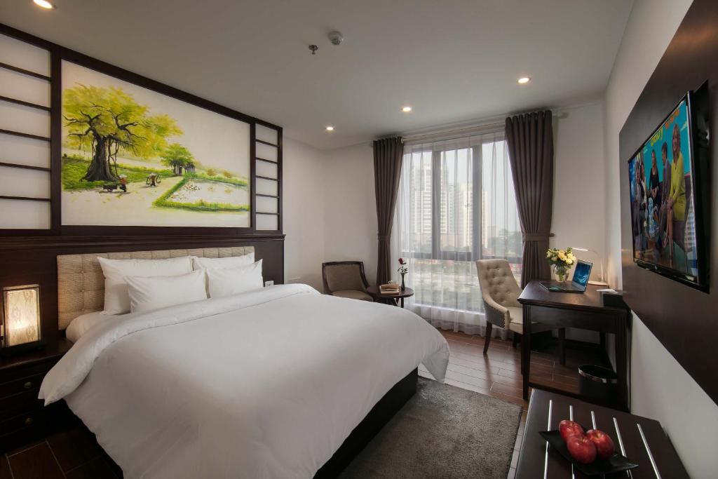 Katil atau katil-katil dalam bilik di Bradi Gate- 22Land Residence Hotel