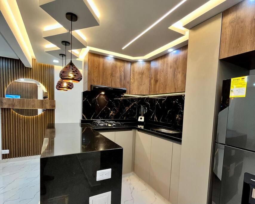 Kuchyň nebo kuchyňský kout v ubytování Lujoso apartamento en la ciudad de Neiva-Huila