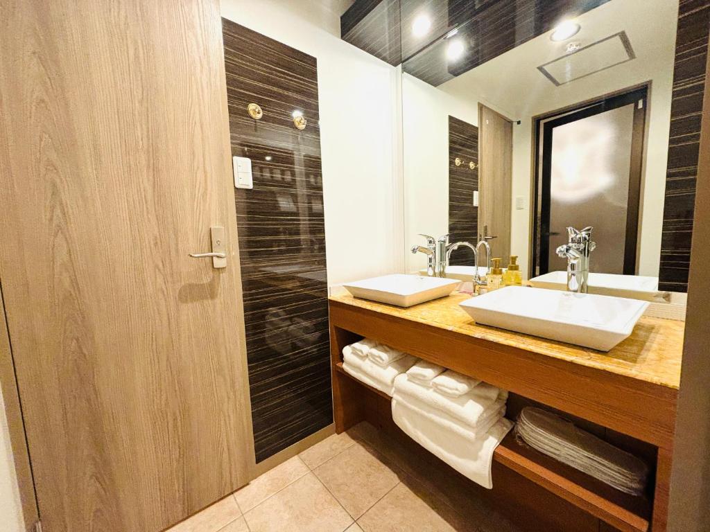 Koupelna v ubytování 嵐 Hotel Arashi Shinsaibashi No001