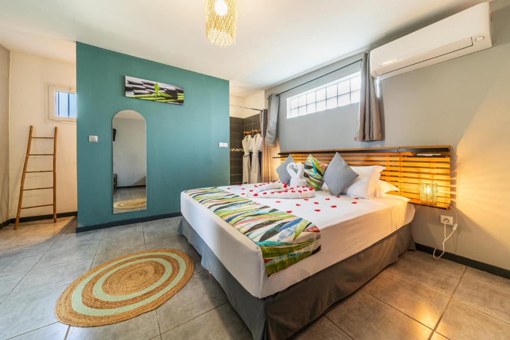 Postel nebo postele na pokoji v ubytování Hotel Exsel Victoria