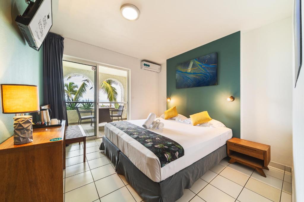 Postel nebo postele na pokoji v ubytování Hotel Exsel Victoria