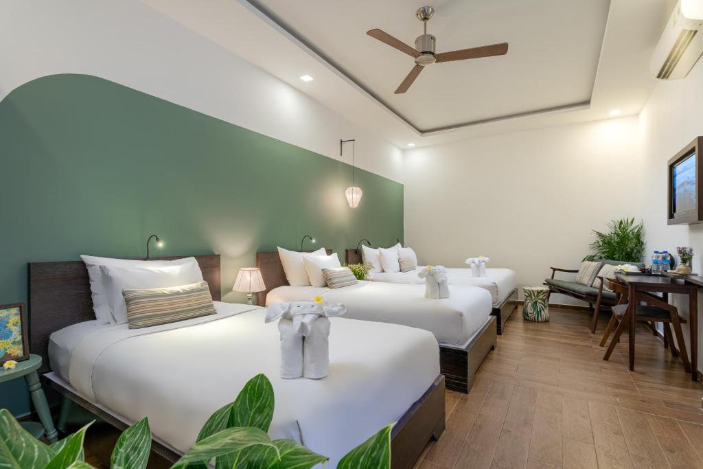 Volar Hoi An - Deluxe Quadruple Room With Balcony